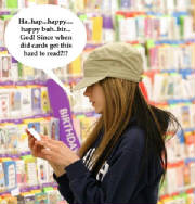 Avril buys a card for...herself.